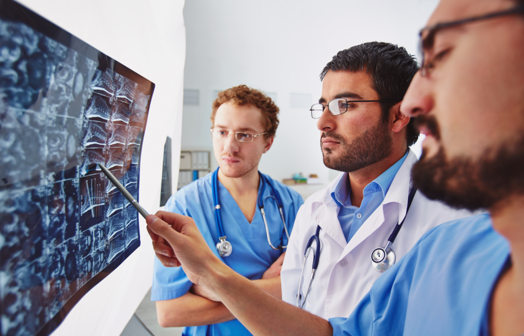 Healthcare practitioners check X-ray images