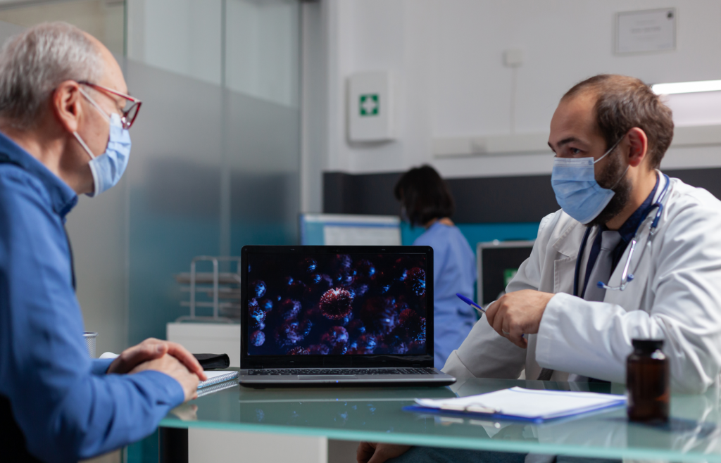 Reshaping Patient Care, Diagnostics, and Remote Monitoring with FHIR AI in Healthcare 1 A doctor explaining how the virus affects the patient's organism