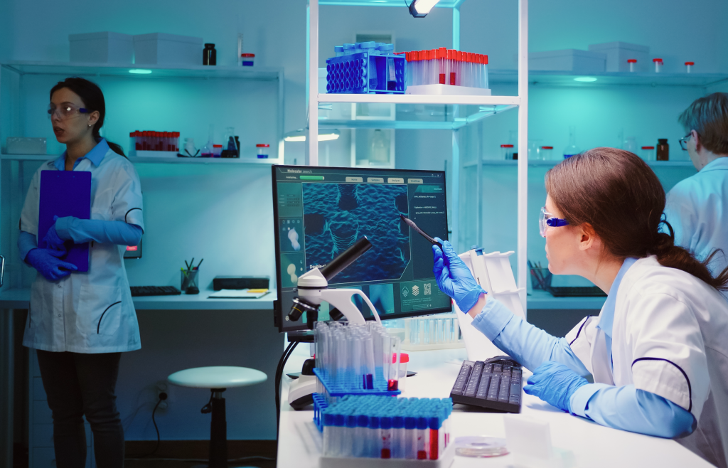 A healthcare professional analyzing histopathological data