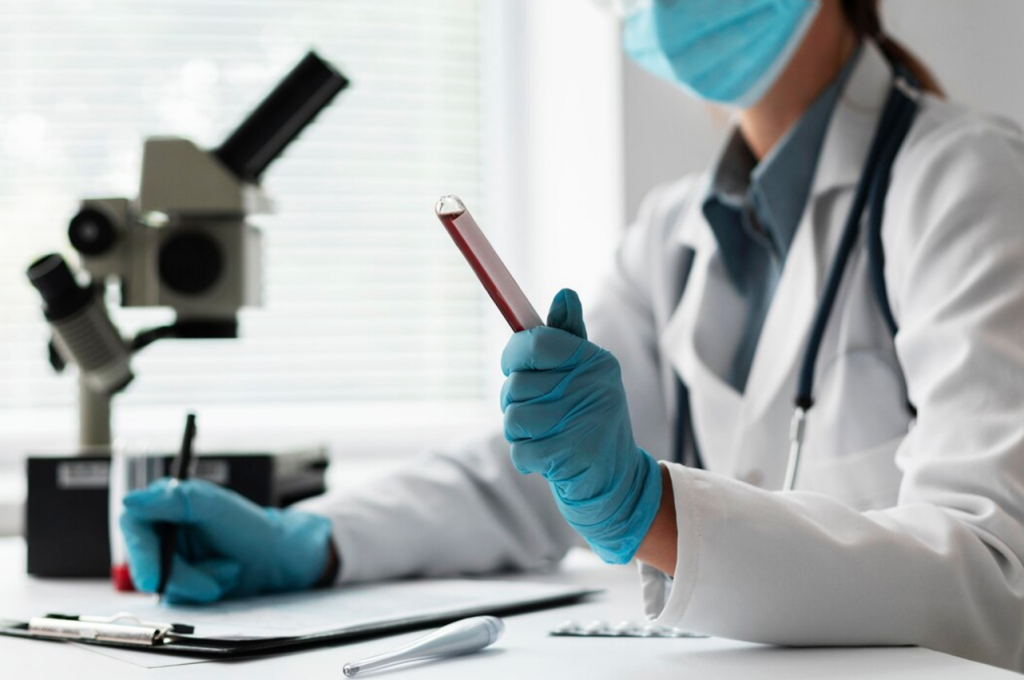 A medical professional performing blood analysis