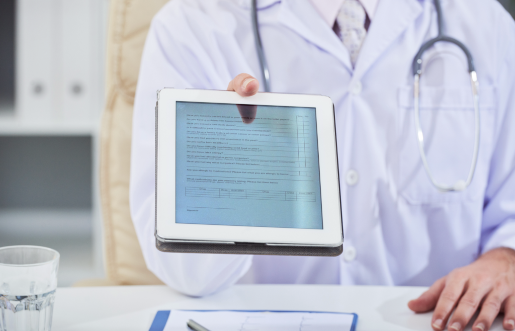 A doctor working with an EHR platform