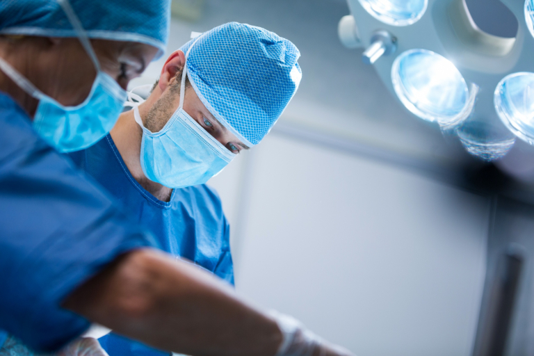 Surgeons performing operation